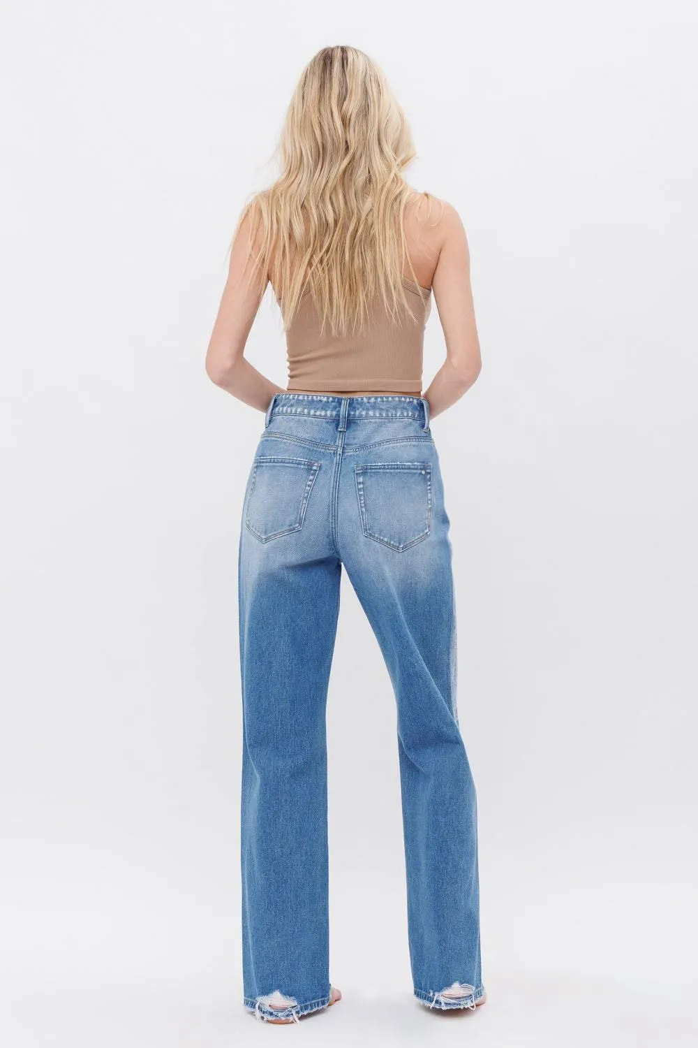 MICA Asymmetric crossover Waist Frayed Heel Jeans